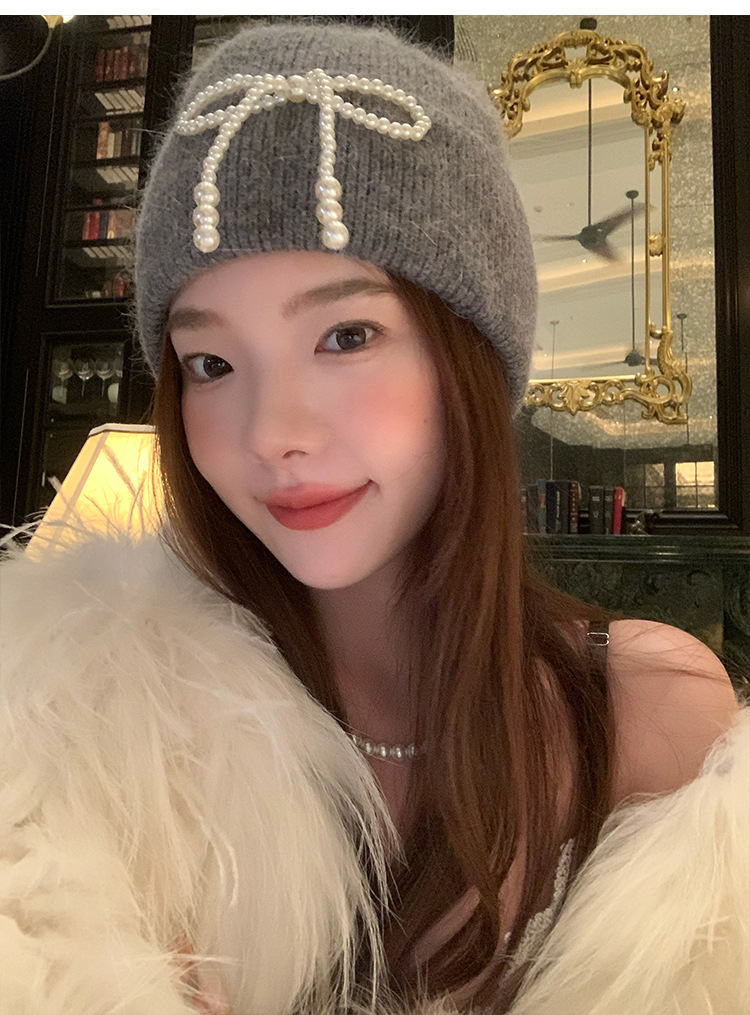 Cappello di lana impilabile Baotou alla moda, piccolo, lavorato a maglia, autunno e inverno, con fiocco di perle, protezione per le orecchie in peluche_voghion.com