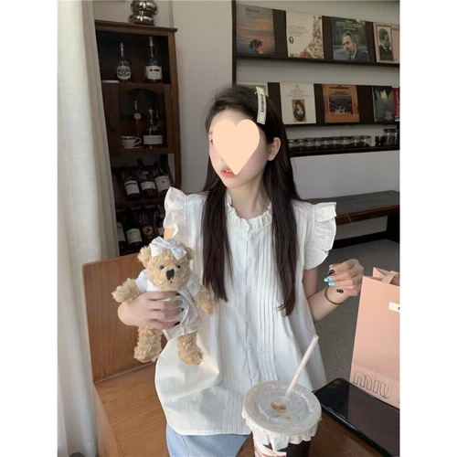 French-inspired, sweetly chic petite fly-sleeve blue plaid shirt for women—summer, retro, and uniquely designed with delicate ruffled edges and a sleeveless top.