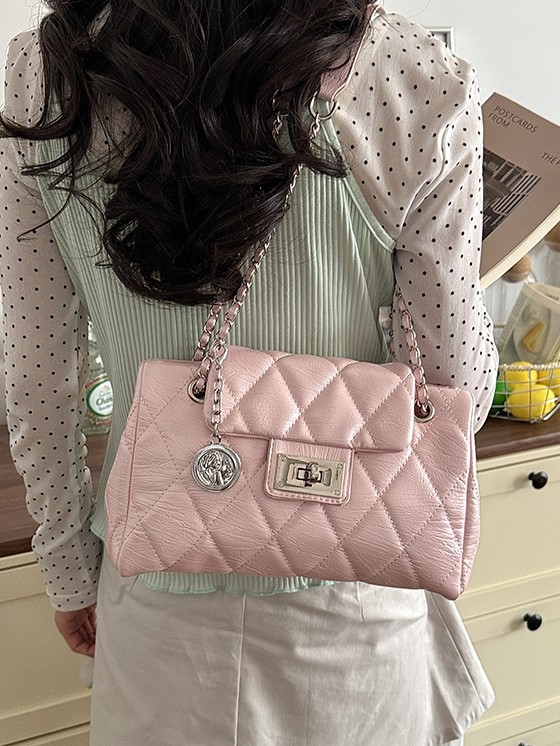 Bolso de cadena de grille de alta calidad para mujeres 2026 nuevo lujo cruzado de hombro ligero mochila de viaje ocio bolsa de mano
