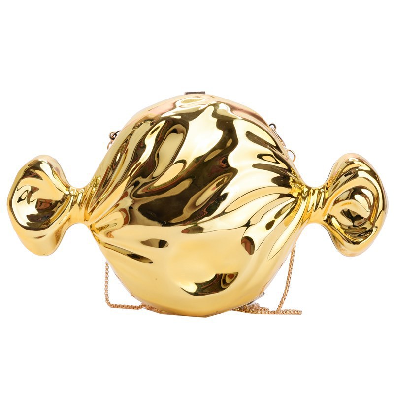 Bolsa de cena de lujo ligera transfronteriza cara brillante personalidad forma de caramelo bolso de mochila moda acrílico cadena bolso de noche mujer