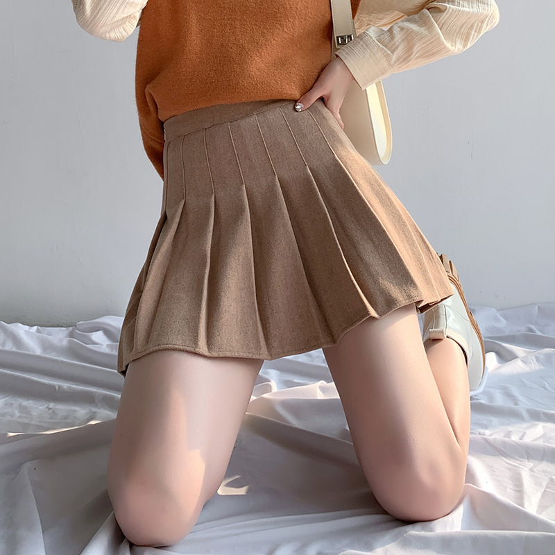 女性の春と秋の毛のスカートの小さいサイズの高腰はやせているa字のスカートの灰色の秋冬のスカートを現します。|undefined