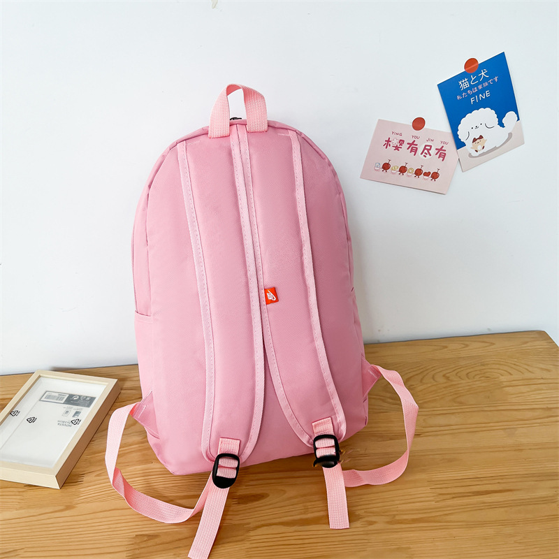 Wholesale Letter backpack for men and women, large capacity, simple