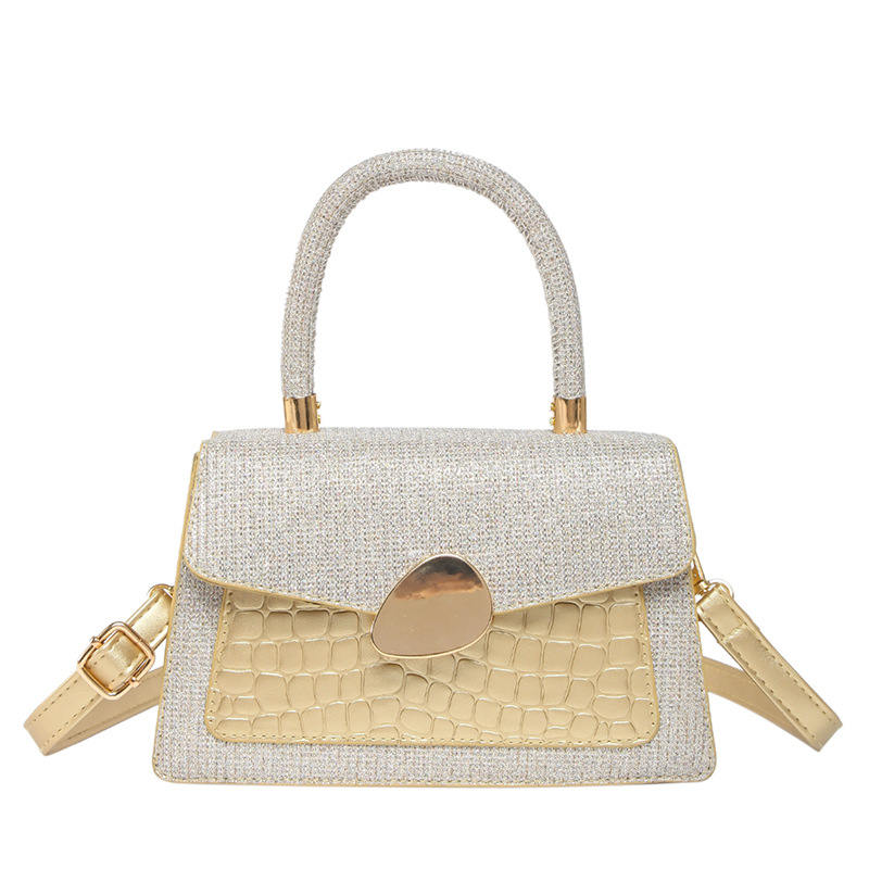 Hong Kong retro caramelo bolso de mujer 2025 moda nueva mochila de moda estilo extranjero cocodrilo empalme bolso pequeño