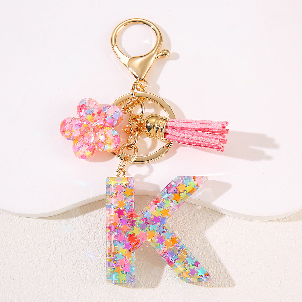 Un nuevo llavero flor de goteo de goma esquinilla 26 letras bolsos colgante llavero accesorios Yiwu