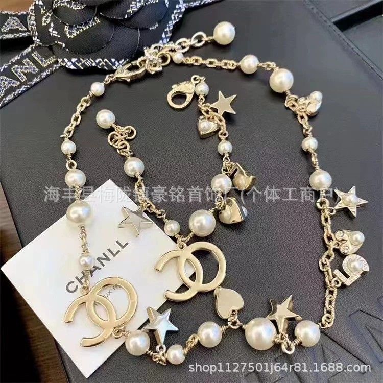 25 新しい Xiaoxiang ネックレス女性の真珠五芒星鎖骨チェーンハイエンドダブル C レターセーターチェーンメーカー卸売|undefined