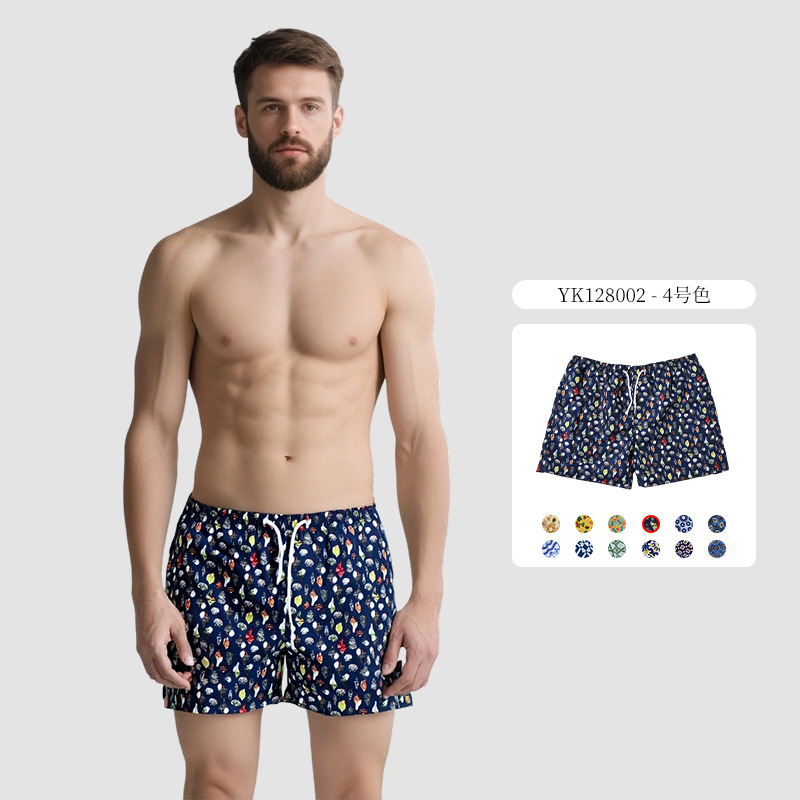 Pantalones de cuatro puntos florales de piel de melocotón para hombre, bañador casual de playa de tamaño europeo, forro de secado rápido, pantalones de playa de vacaciones junto al mar