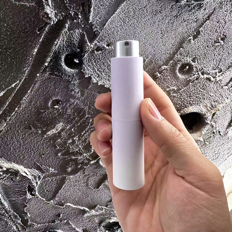 En stock 8/10ml de perfume giratorio sub-botella ambientador oral botella de spray botella de perfume de prensado de alta gama botella de spray bucal
