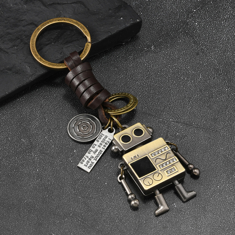 Cross-Border Robot Keychain, Simple and Personalized Retro Woven Leather, Movable Hands and Feet, Alloy Robot Accessories