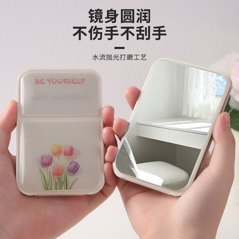 Inswind encantador de alto valor facial espejo de maquillaje espejo plegable pequeño espejo portátil de vestir espejo de estudiantes