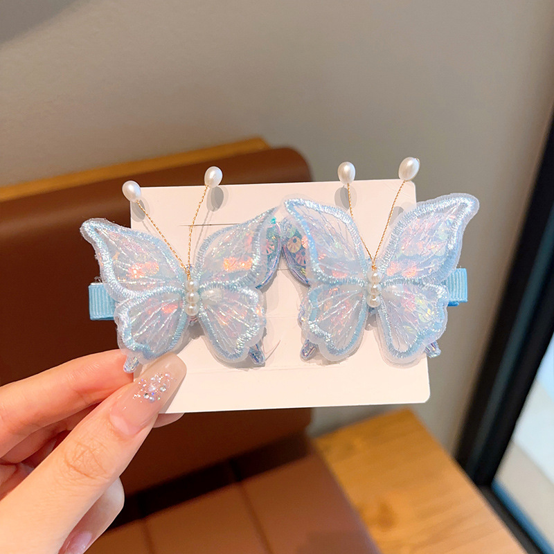 Un par de mariposas azul