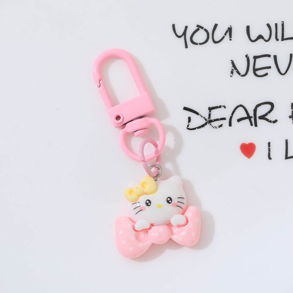 Cartoon Moon Cat DIY accesorios de resina llaveros Sanrio arco gato bolsas colgantes de chicas