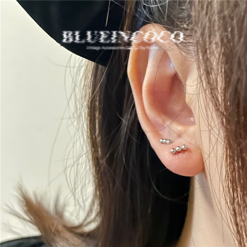 Pendientes de cuentas redondas para mujer, pendientes con hebilla de tornillo, pendientes de piercing de oreja de moda, pequeños, exquisitos, modernos y personalizados, uñas de hueso del oído de alta gama