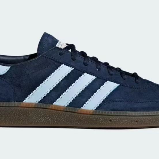 Putian transfronterizo nuevo estilo de tres hojas Spzl Dexun tendencia retro pareja de zapatos deportivos casuales para hombres y mujeres.