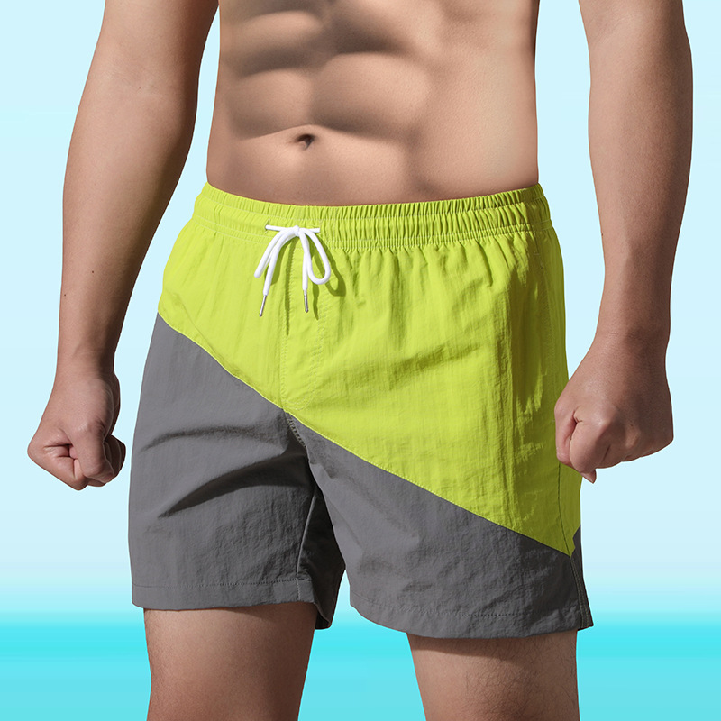 대외 무역 남성 여름 스포츠 반바지 남성 겉옷 컬러 블록 비치 바지 루즈 캐주얼 대형 5부 바지 도매