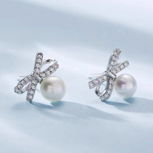 镶钻蝴蝶结耳钉女轻奢小众气质仿珍珠明星同款锆石耳饰新品批发