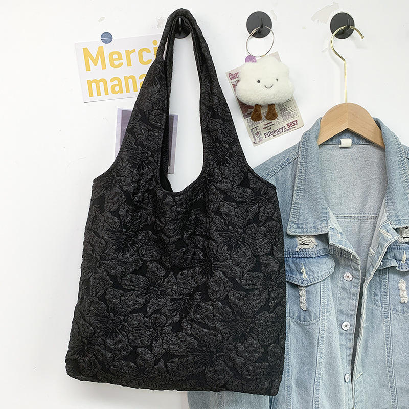 Black vest, flowered