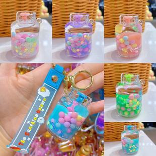 Net red hot tile tank refueling tank quicksand key chain luminous gas tank color beads creative oil leakage gift