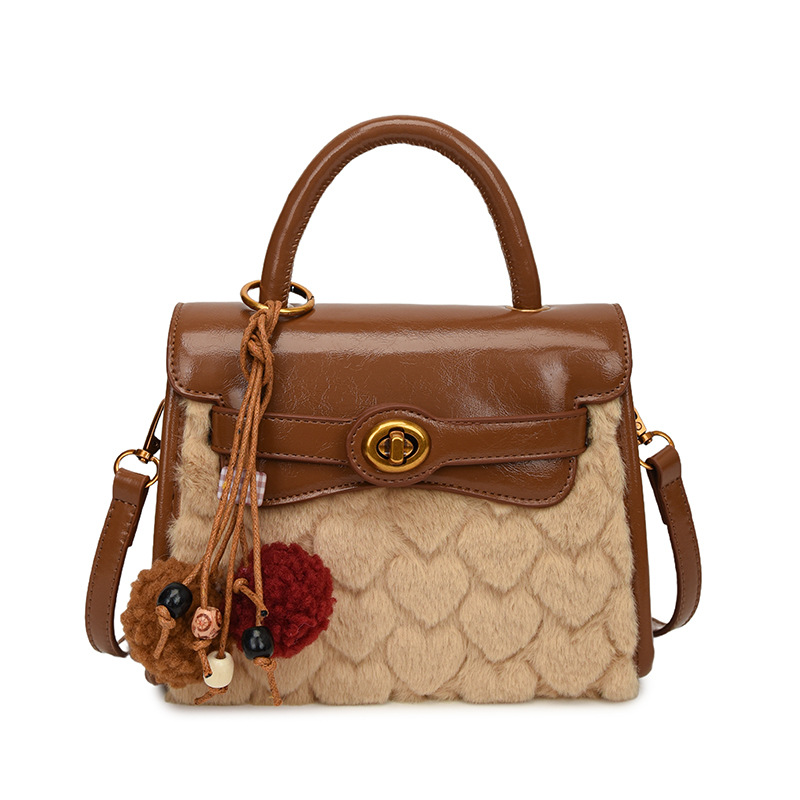 Otoño y invierno de alto nivel bolso de lana portátil para mujeres 2025 nuevo nicho Zhong commuting bolso de hombro bolso casual Kelly