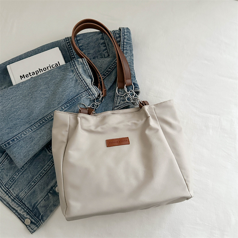 Casual bolsa de viaje de gran capacidad para mujeres 2024 nueva moda bolsa de lona universal bolso de hombro universal bolso simple