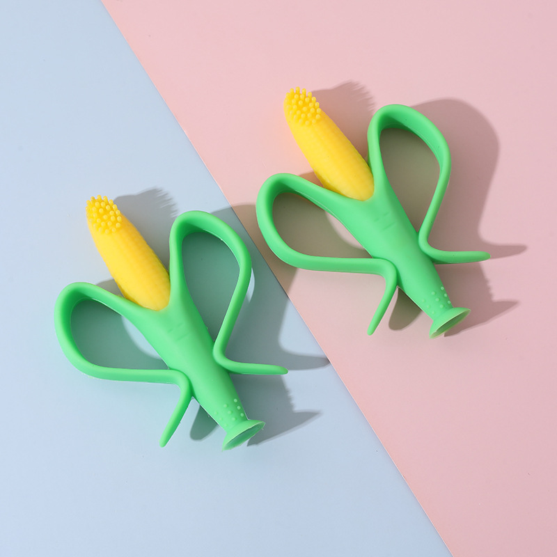 Inglés embalaje independiente bebé completo de silicona maíz mordedor cepillo de dientes en forma de flor mordida pegamento dientes titular bebé mordedor