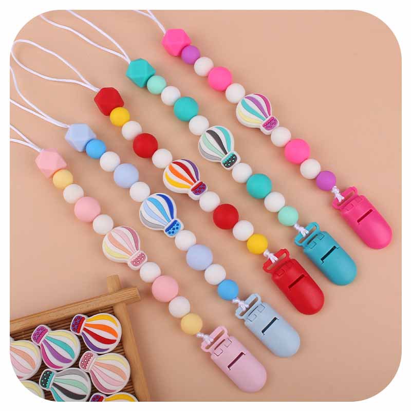 Bebé dibujos animados colorido globo de aire caliente silicona teether bebé teether palo juguete teether pezón cadena anti-caída