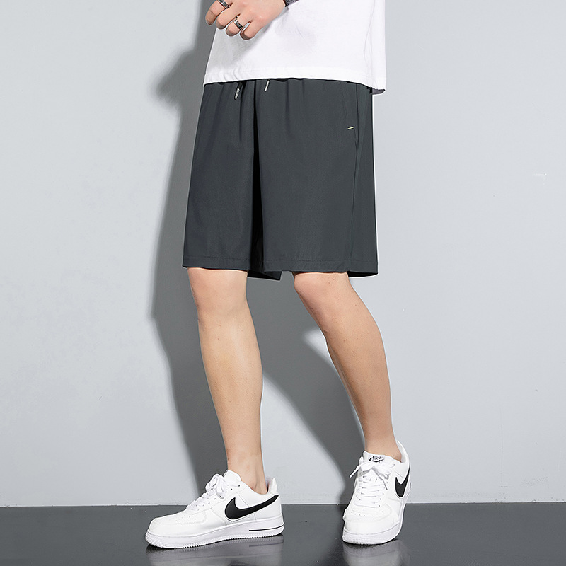 2023 Nuevos pantalones cortos casuales de seda de hielo ropa de verano para hombres sueltos pantalones cortos deportivos de secado rápido para hombres de talla grande