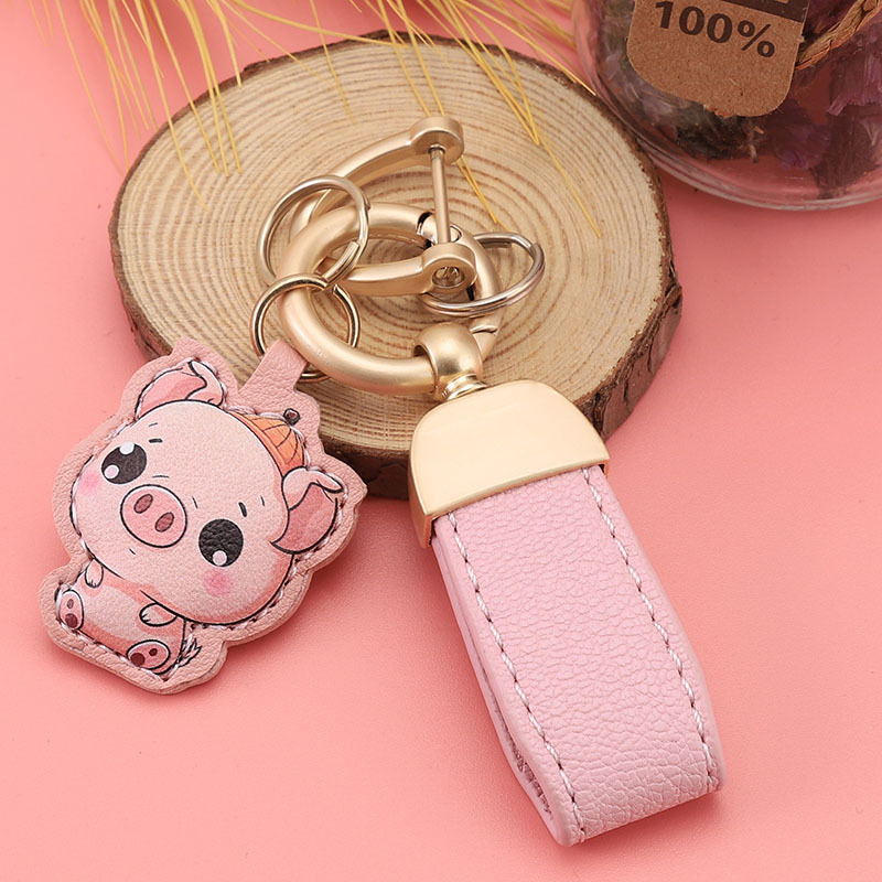 Nuevo llavero de piel de cordero francés pequeño llavero fresco colgante mini bolso corto colgante pequeño joyería