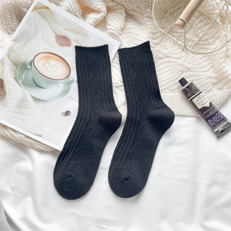 ウールの靴下の子供の秋冬の保温は厚いです。