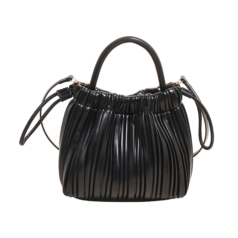 2025 otoño y invierno nuevo bolso plegable bolso de cubo de cuerda de tracción universal bolso de hombro de moda de mujer bolso de viaje