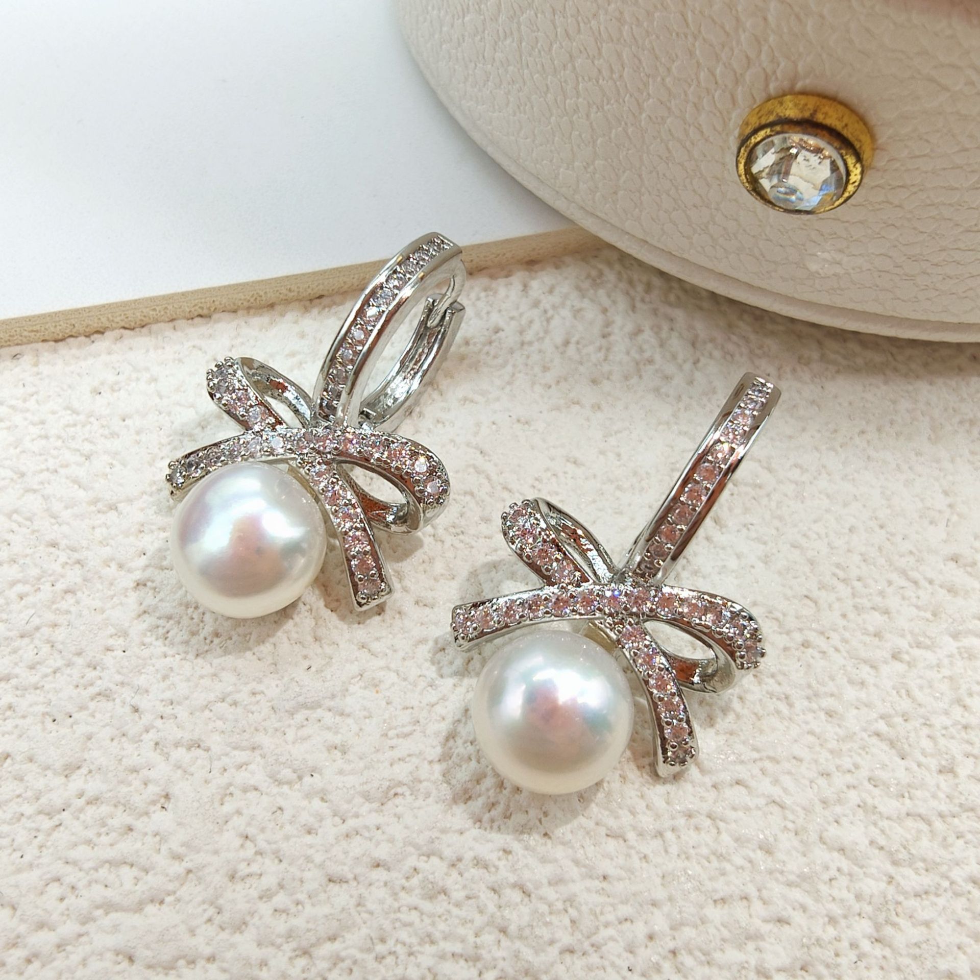 French-style bowknot natural pearl earrings for women, light luxury, high-end, niche, unique, popular, elegant earrings