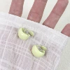 Green mosquito coil, ear clips