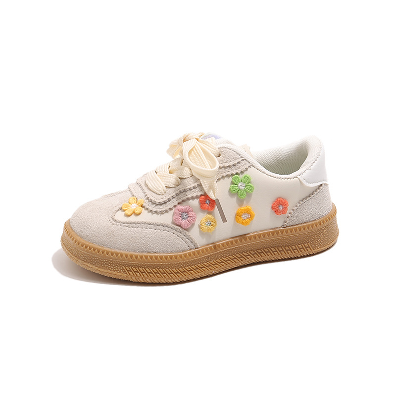 Zapatos deportivos de niñas para niños flores extranjeras zapatos de skate de otoño 2026 nuevos zapatos casuales de niñas con suela suave zapatos de entrenamiento alemán