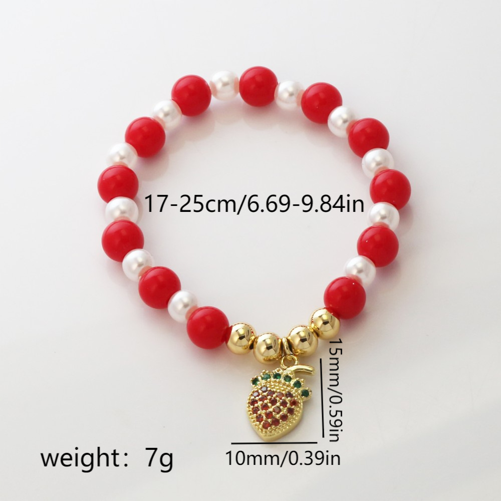 Pulsera con labios, perla y fresa esmaltados