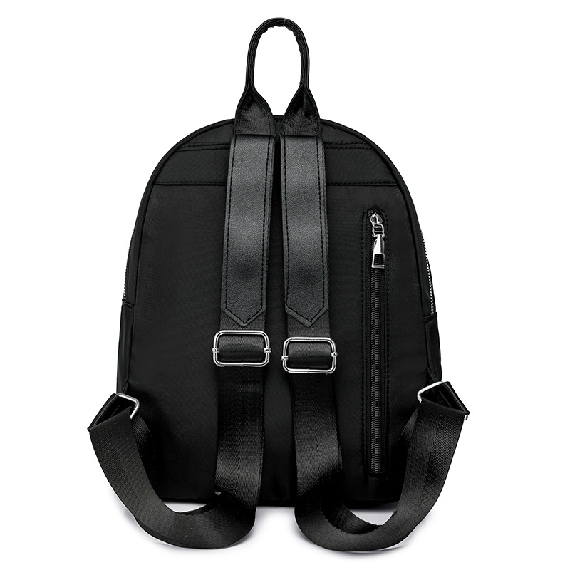 Mochila para mujer 2024 nueva mochila pequeña de nailon de moda de color sólido de alta gama mochila ligera para mujer