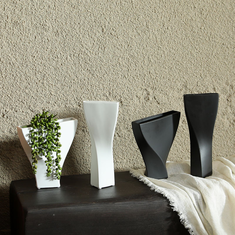 Creativo estilo antiguo jarrón de cerámica blanco y negro arreglos florales secos adornos decorativos modernos utensilios de flores giratorias abstractas geométricas