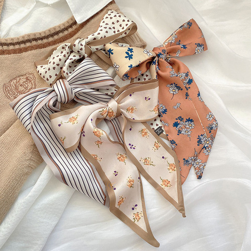 A white-bright coffee color floral silk scarf, long and narrow, small and versatile, suitable for tying a ponytail in a braided style, a floating hairband.