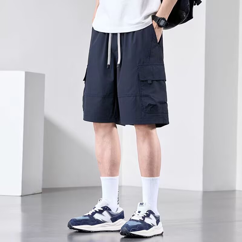 Camisas con menos ropa, pantalones casuales de seda de hielo ligeros, estilo fino de verano para hombres, monos estadounidenses transpirables, pantalones cortos sueltos de cinco puntos