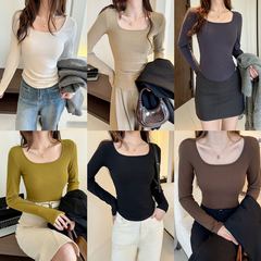 ネジネックの高品質モーデール純色のボトムシャツの女性春と秋には、肩の長袖tシャツの上着を着て底を打ちます。