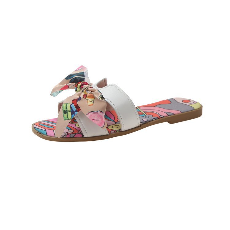 Cintas de colores zapatillas de arco de talón plano de verano para mujeres nuevas zapatillas de flores al por mayor