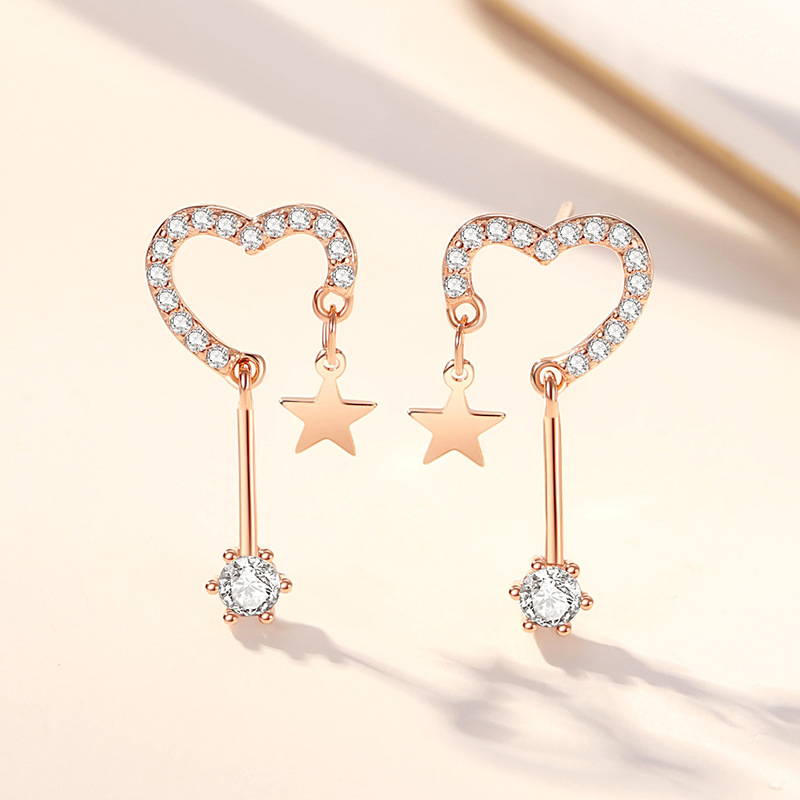 Estilo coreano Stud pendientes 925 Estrella de Plata encantadora borla pendientes largos nichos femeninos diseño sentido alto sentido Stud pendientes al por mayor