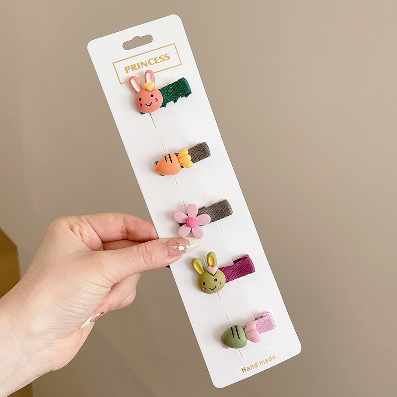 Hermosos clips de cabello de color para niños coreanos de alto nivel sensación de arco de niñas bolsa de tela no daña clips de cabello de bebé