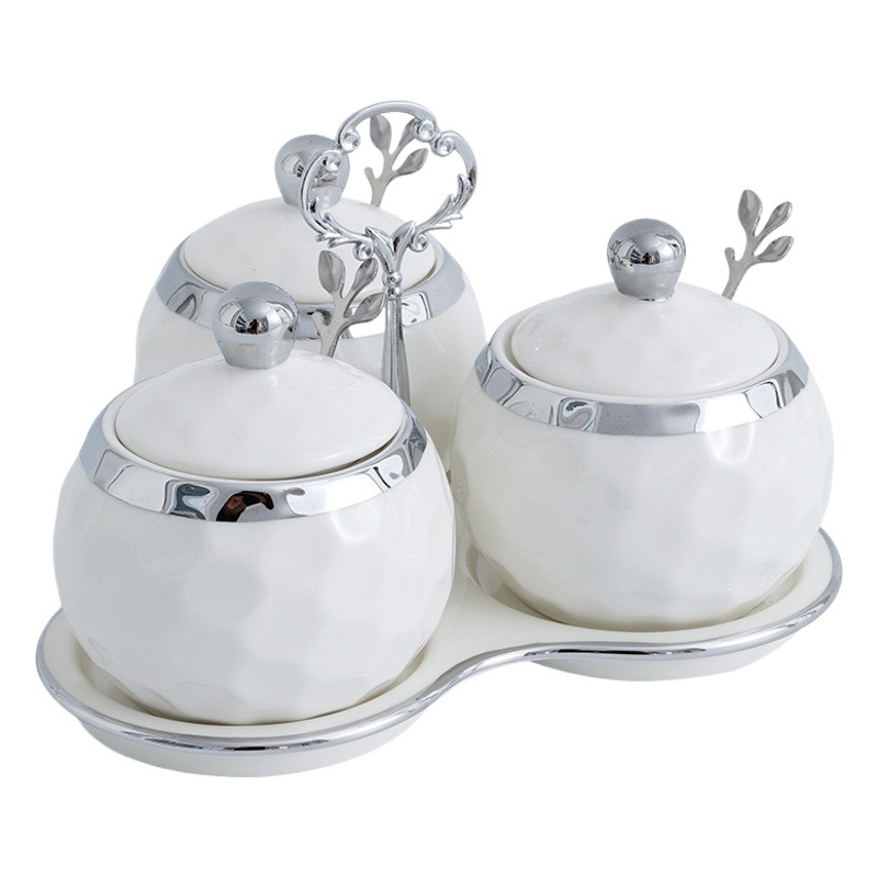 Luz de lujo borde plata tarro de condimento traje hogar botella de condimento de cerámica con tapa sal MSG Jar cocina combinación de almacenamiento
