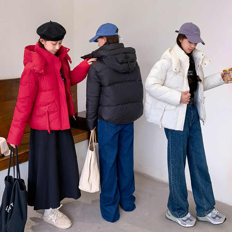 Capa de algodón de pluma para mujeres 2024 nuevo invierno grueso corto de moda con capuchón calentamiento abrigo de pan suelto image 1