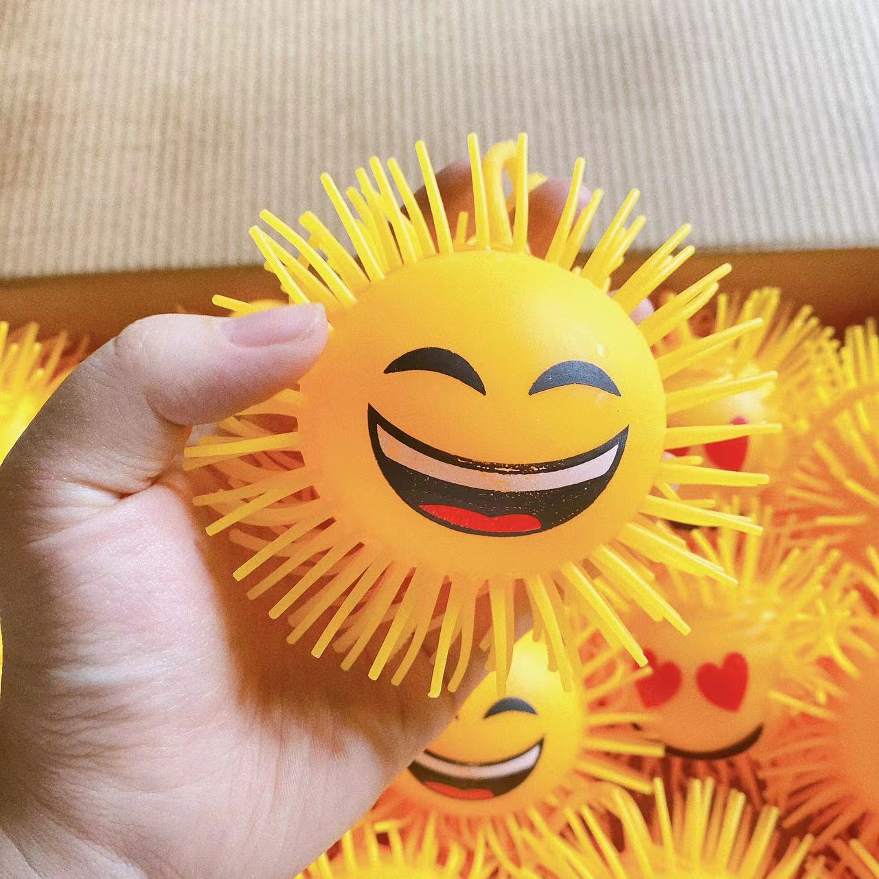 Juguete de dibujos animados expresión luminosa bola piel Smiley cara ventilación descompresión pellizco juguete la música de los niños dos Yuan tienda
