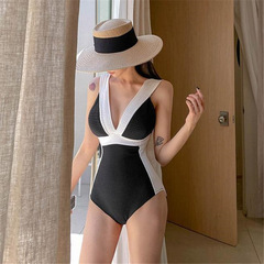 2022 Black and White Minimalist Striped Chanel-style V-neck Sexy Vacation One-piece Swimsuit for Women