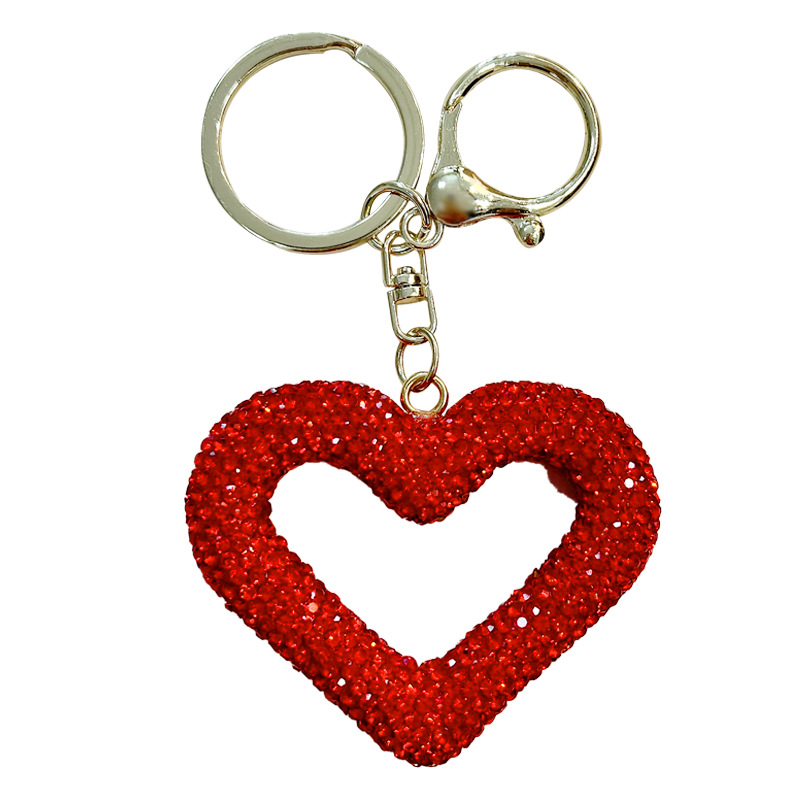 Llavero de corazón de melocotón de diamantes huecos, llavero de coche de amor de diamantes creativos, cubierta de auriculares portátil, colgante pequeño