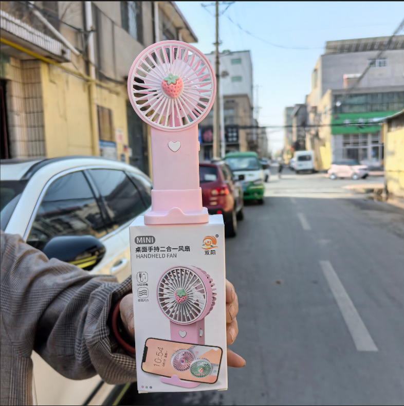 Hot-selling mini handheld fan, portable, high-powered, desktop/handheld 2-in-1, wholesale.