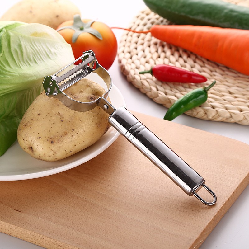 Fábrica al por mayor multifuncional Smiley cara de doble uso pelador hogar melón y fruta peeling cuchillo herramientas de cocina