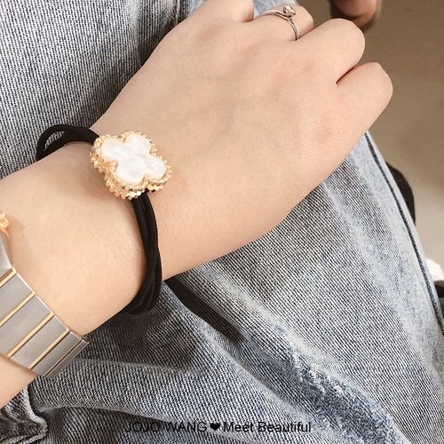 The clover that symbolizes luck ~ hair tie, hair accessory, rubber band, Korean hairband, flower, elegant, simple style and versatile