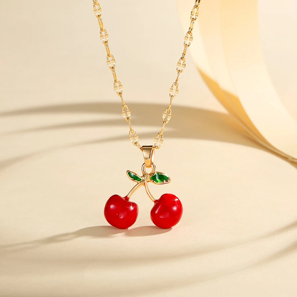 Frutas de explosión transfronteriza series de cereza roja ágata colgante collar pendientes pendientes set de joyas de moda para mujeres